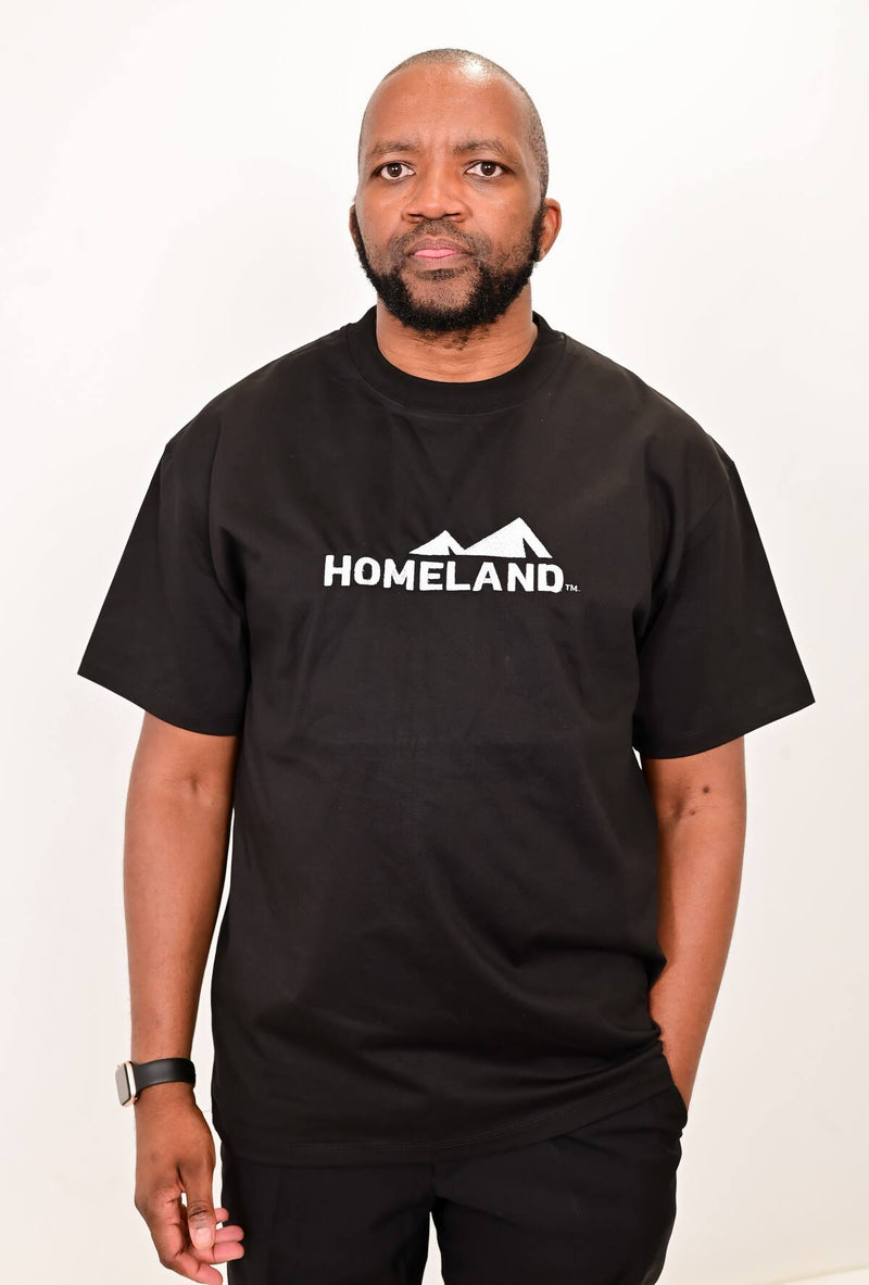 Man wearing a black HomeLand crew-neck T-shirt